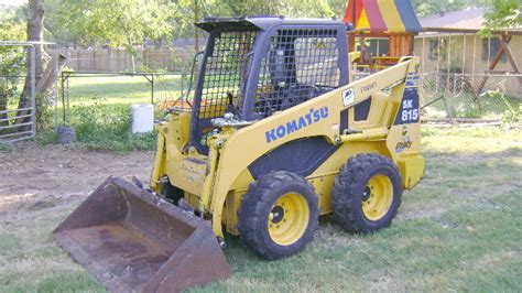 komatsu sk815 skid steer specs|Komatsu SK815.